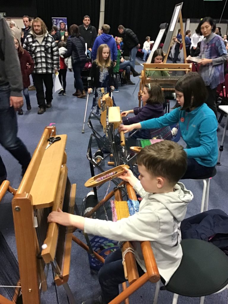 3 kids weaving